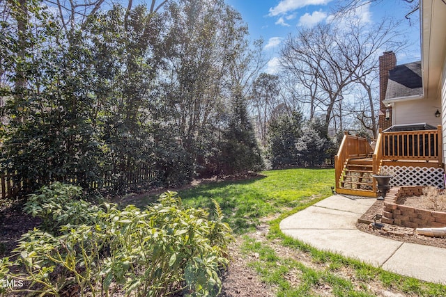 view of yard featuring a deck