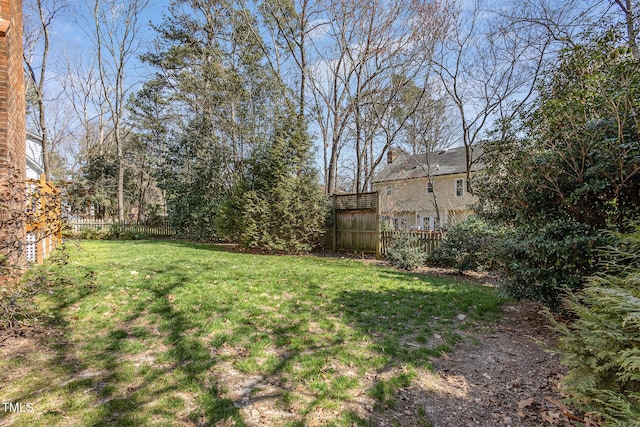 view of yard featuring fence