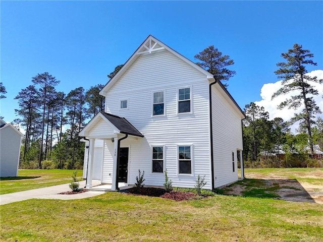 view of front of home featuring a front lawn