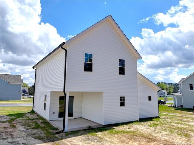 rear view of house with a patio area
