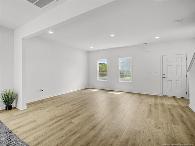232 Penfield Way, Raeford, NC 28376 - unfurnished living room featuring light wood finished floors, recessed lighting, and baseboards
