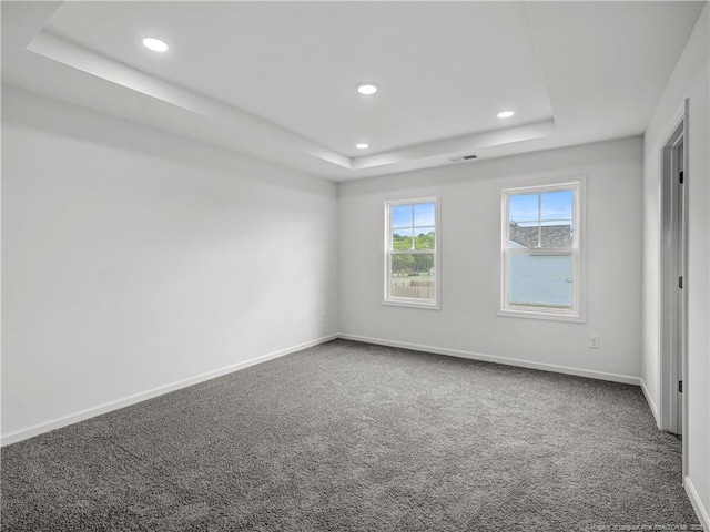 232 Penfield Way, Raeford, NC 28376 - carpeted spare room with a tray ceiling, recessed lighting, and baseboards