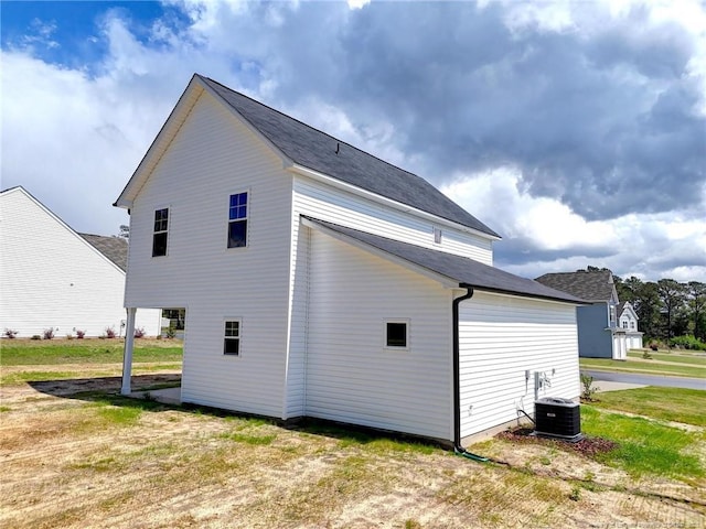 232 Penfield Way, Raeford, NC 28376 - view of side of home with central AC and roof with shingles