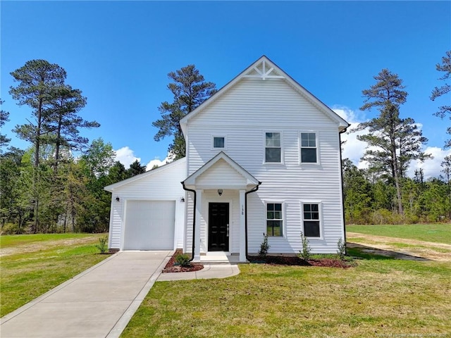 232 Penfield Way, Raeford, NC 28376 - view of front facade featuring concrete driveway, an attached garage, and a front lawn