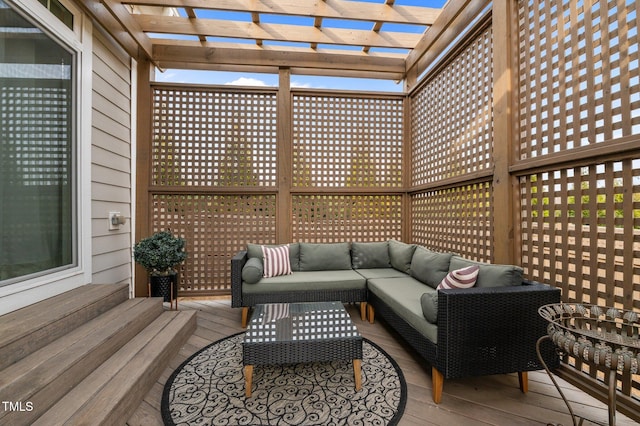 deck with a pergola and an outdoor hangout area