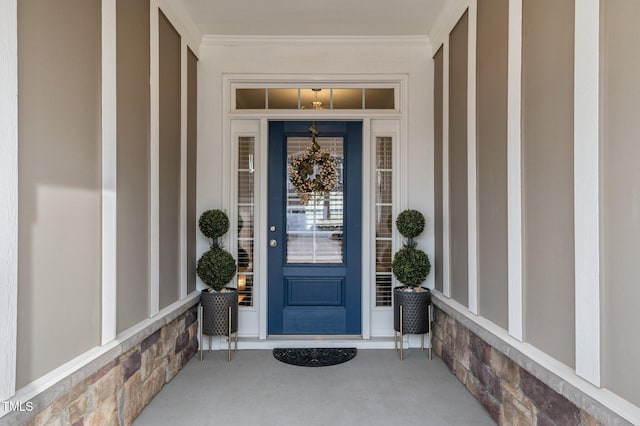 doorway to property featuring a porch