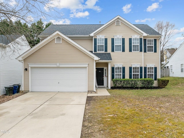 view of front of home featuring a front yard, an attached garage, driveway, and roof with shingles