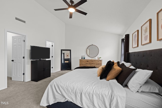 bedroom with a ceiling fan, baseboards, visible vents, high vaulted ceiling, and light carpet