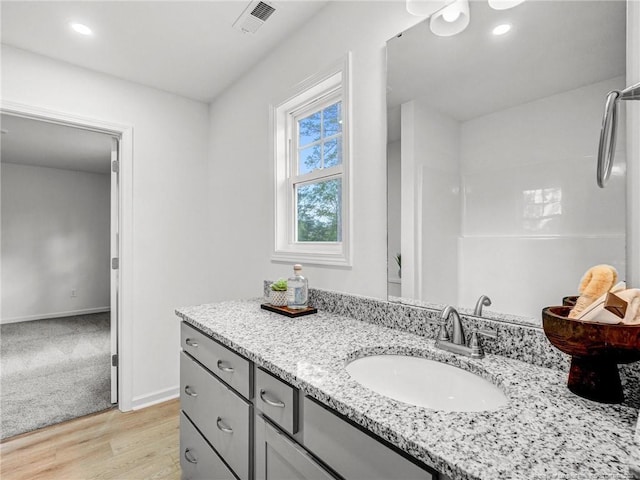 330 Penfield Way, Raeford, NC 28376 - bathroom featuring vanity, wood finished floors, and recessed lighting