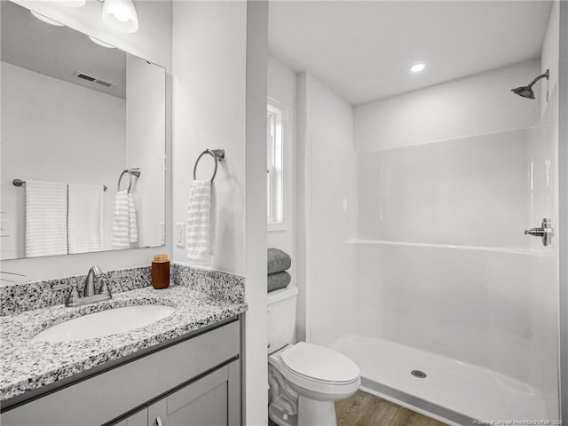 330 Penfield Way, Raeford, NC 28376 - bathroom featuring vanity, wood finished floors, and a shower