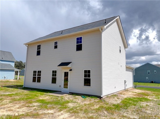 330 Penfield Way, Raeford, NC 28376 - back of house featuring a yard