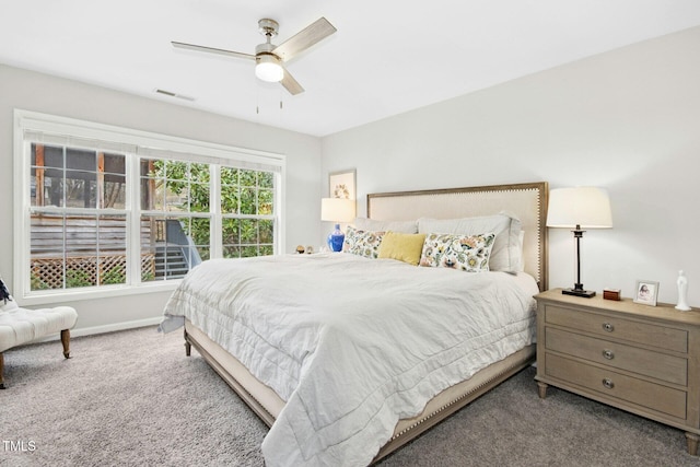 bedroom with a ceiling fan, carpet, visible vents, and baseboards