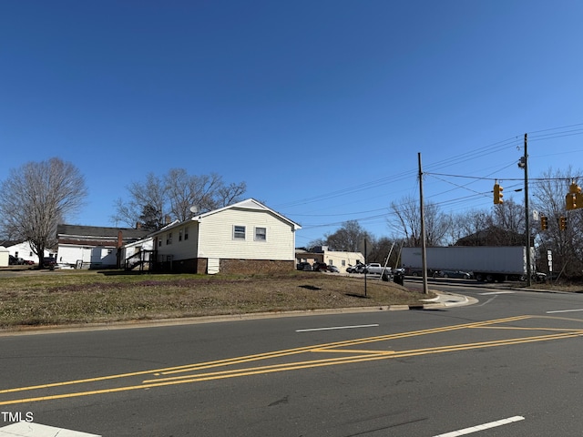 view of road with curbs