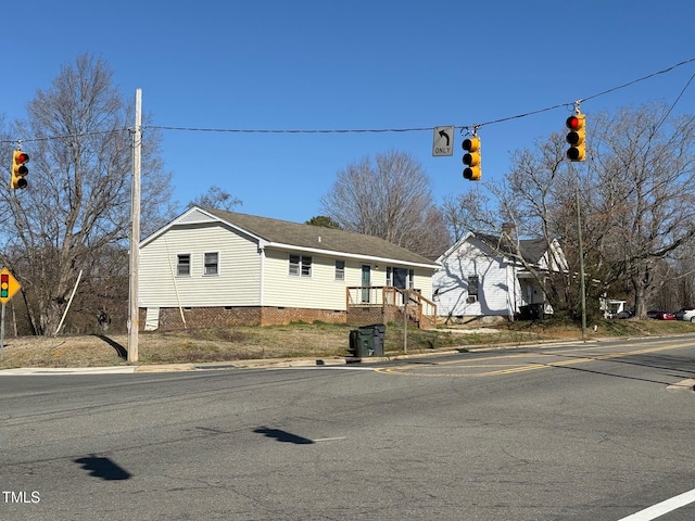 view of front of home with crawl space