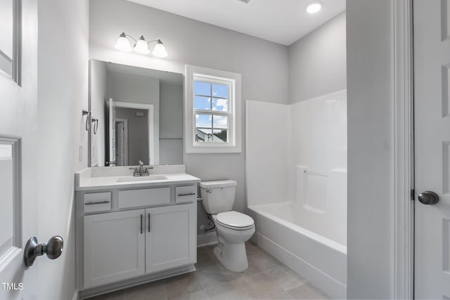 bathroom with vanity,  shower combination, and toilet