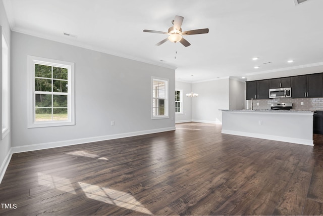 unfurnished living room featuring visible vents, baseboards, dark wood-type flooring, and ornamental molding