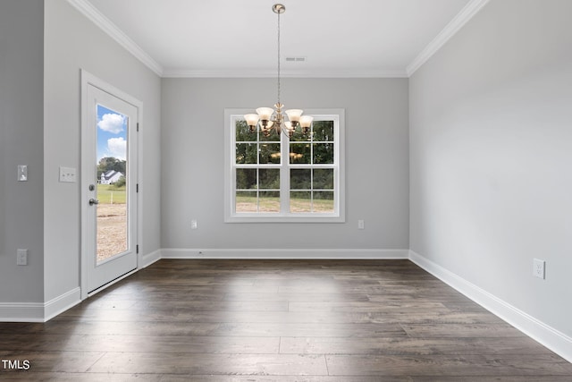 unfurnished dining area featuring a chandelier, baseboards, dark wood finished floors, and ornamental molding