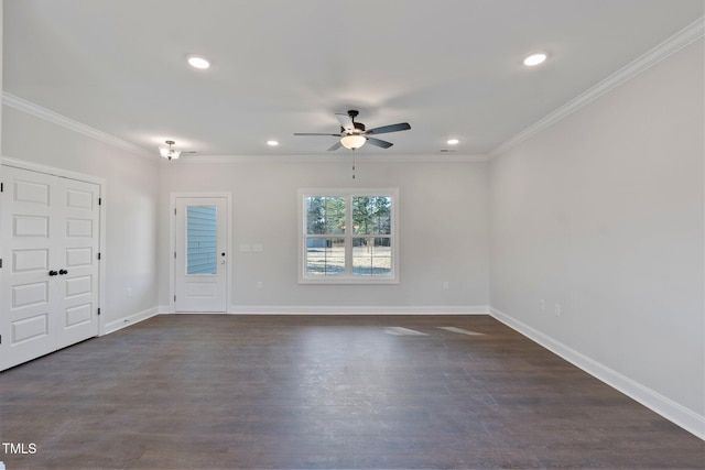 interior space with a ceiling fan, baseboards, dark wood-style flooring, and ornamental molding