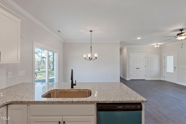 kitchen with ornamental molding, dishwasher, light stone countertops, and a sink