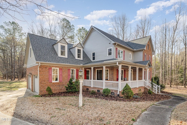 view of front facade featuring a porch, roof with shingles, concrete driveway, crawl space, and brick siding