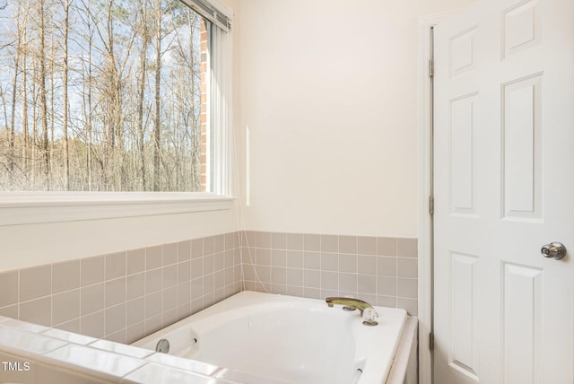 full bathroom featuring a garden tub