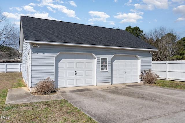 detached garage with fence