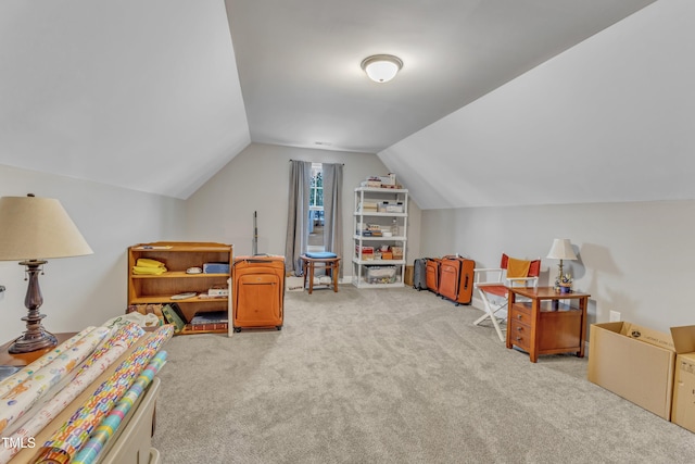 interior space featuring lofted ceiling and light carpet