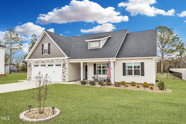 view of front of house featuring a porch, concrete driveway, a front yard, and fence