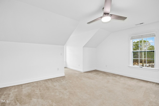 bonus room with visible vents, baseboards, ceiling fan, lofted ceiling, and carpet flooring