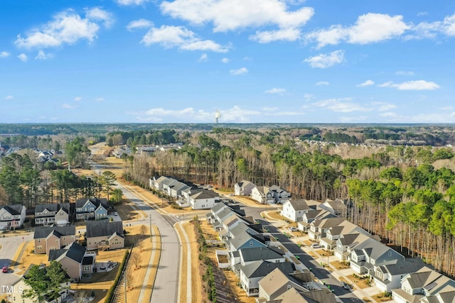 bird's eye view with a residential view and a view of trees