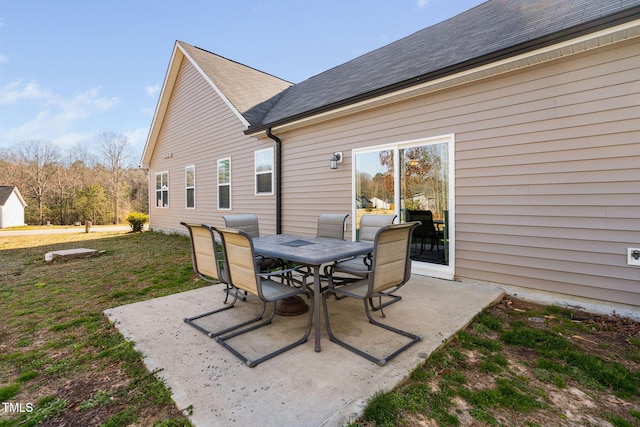 view of patio featuring outdoor dining area