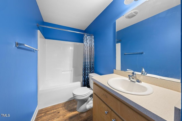 bathroom with visible vents, shower / bathtub combination with curtain, toilet, wood finished floors, and vanity