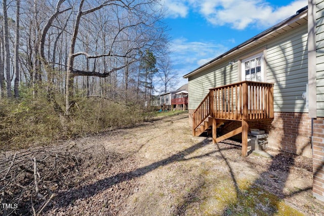 view of yard with a deck