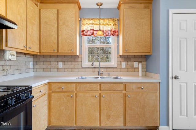 kitchen featuring range hood, light brown cabinets, a sink, light countertops, and black range with gas stovetop