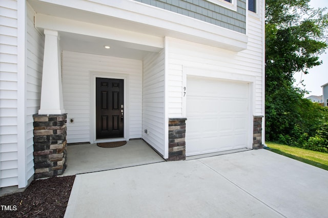 97 Begonia St, Angier, NC 27501 - property entrance with a garage and stone siding
