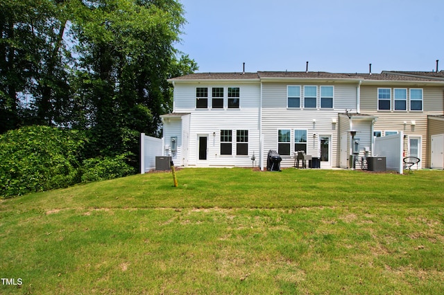 97 Begonia St, Angier, NC 27501 - rear view of house with a yard and cooling unit