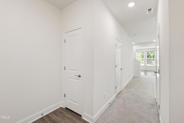 97 Begonia St, Angier, NC 27501 - hallway featuring baseboards, recessed lighting, and wood finished floors