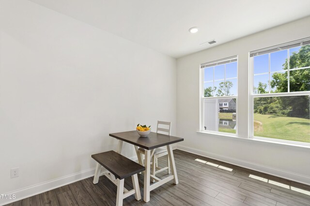 97 Begonia St, Angier, NC 27501 - dining space featuring baseboards, wood finished floors, and recessed lighting
