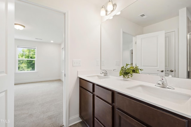 97 Begonia St, Angier, NC 27501 - bathroom featuring double vanity and baseboards
