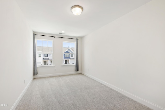 97 Begonia St, Angier, NC 27501 - carpeted spare room featuring baseboards