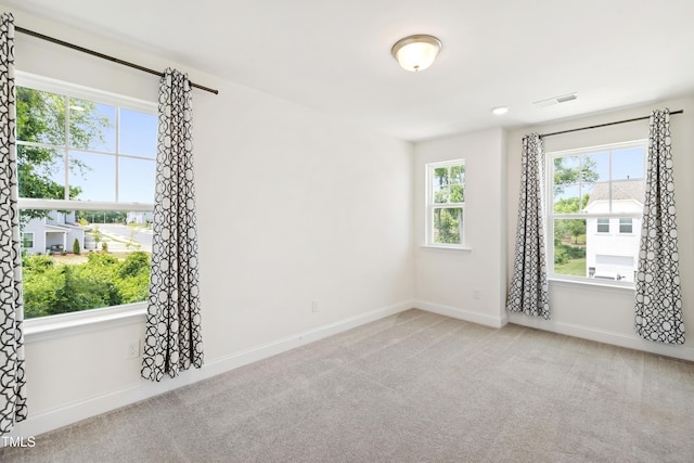 97 Begonia St, Angier, NC 27501 - unfurnished room with carpet floors and baseboards