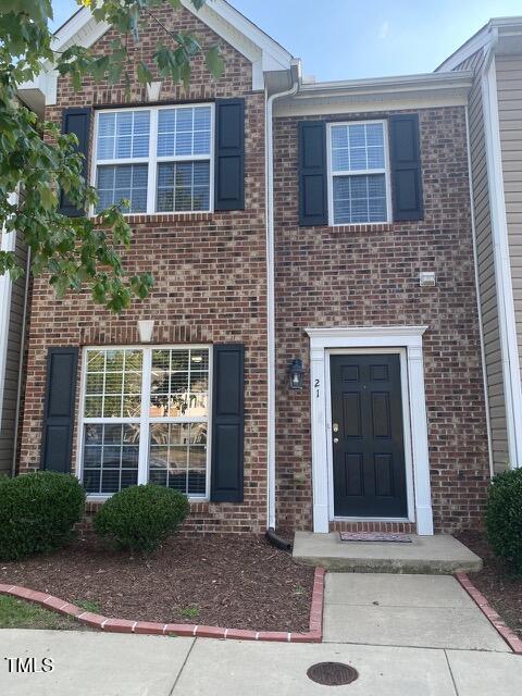 view of front of property with brick siding