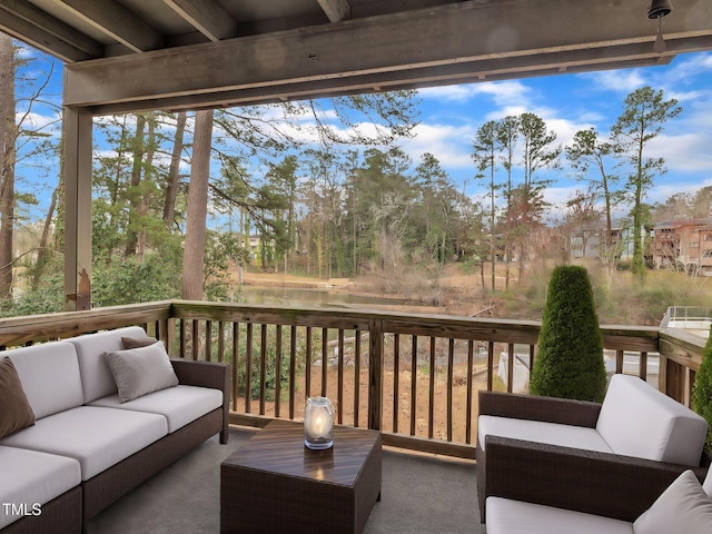 wooden terrace featuring an outdoor living space