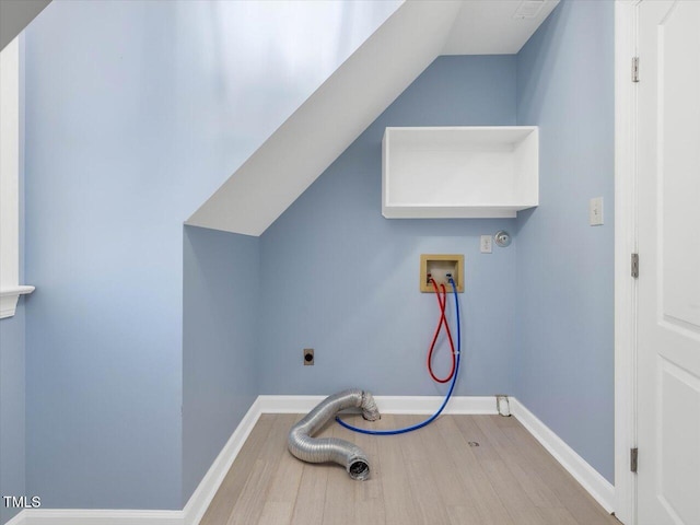 clothes washing area with washer hookup, wood finished floors, baseboards, hookup for an electric dryer, and laundry area