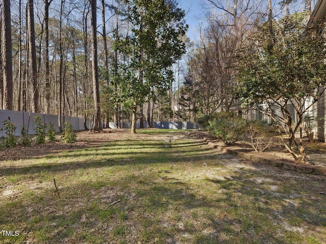 view of yard with fence