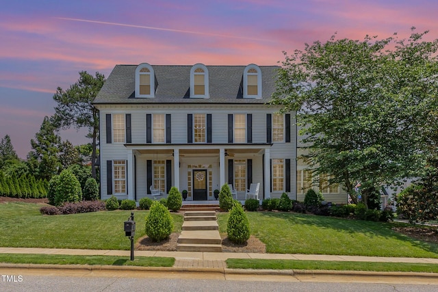 12500 Richmond Run Dr, Raleigh, NC 27614 - view of front of property featuring covered porch, a lawn, and a shingled roof