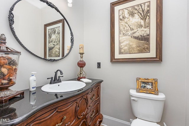 12500 Richmond Run Dr, Raleigh, NC 27614 - half bathroom with vanity, toilet, and baseboards