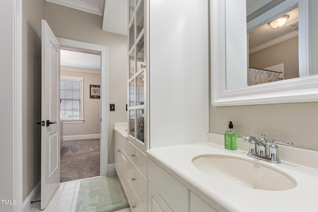 12500 Richmond Run Dr, Raleigh, NC 27614 - full bath with vanity, ornamental molding, and baseboards