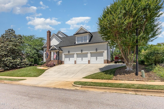 12500 Richmond Run Dr, Raleigh, NC 27614 - view of front of property featuring driveway, a front yard, a chimney, a shingled roof, and a garage