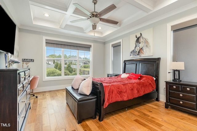 bedroom featuring light wood-type flooring, baseboards, coffered ceiling, and beamed ceiling